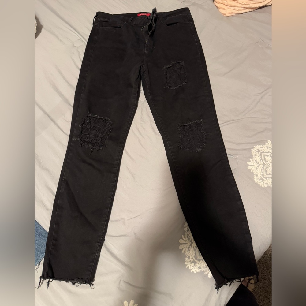 Black Guess jeans. Skinny ripped with lace. Super cute!